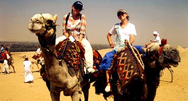Students camel back riding in Egypt